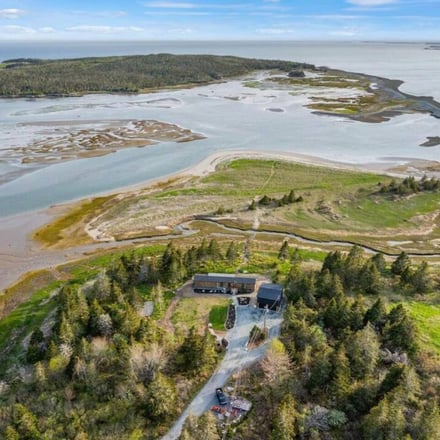Aerial view of the property surrounded by ocean inlets and tidal flats